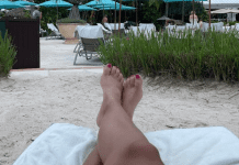 A woman's feet as she relaxes at the beach resort.