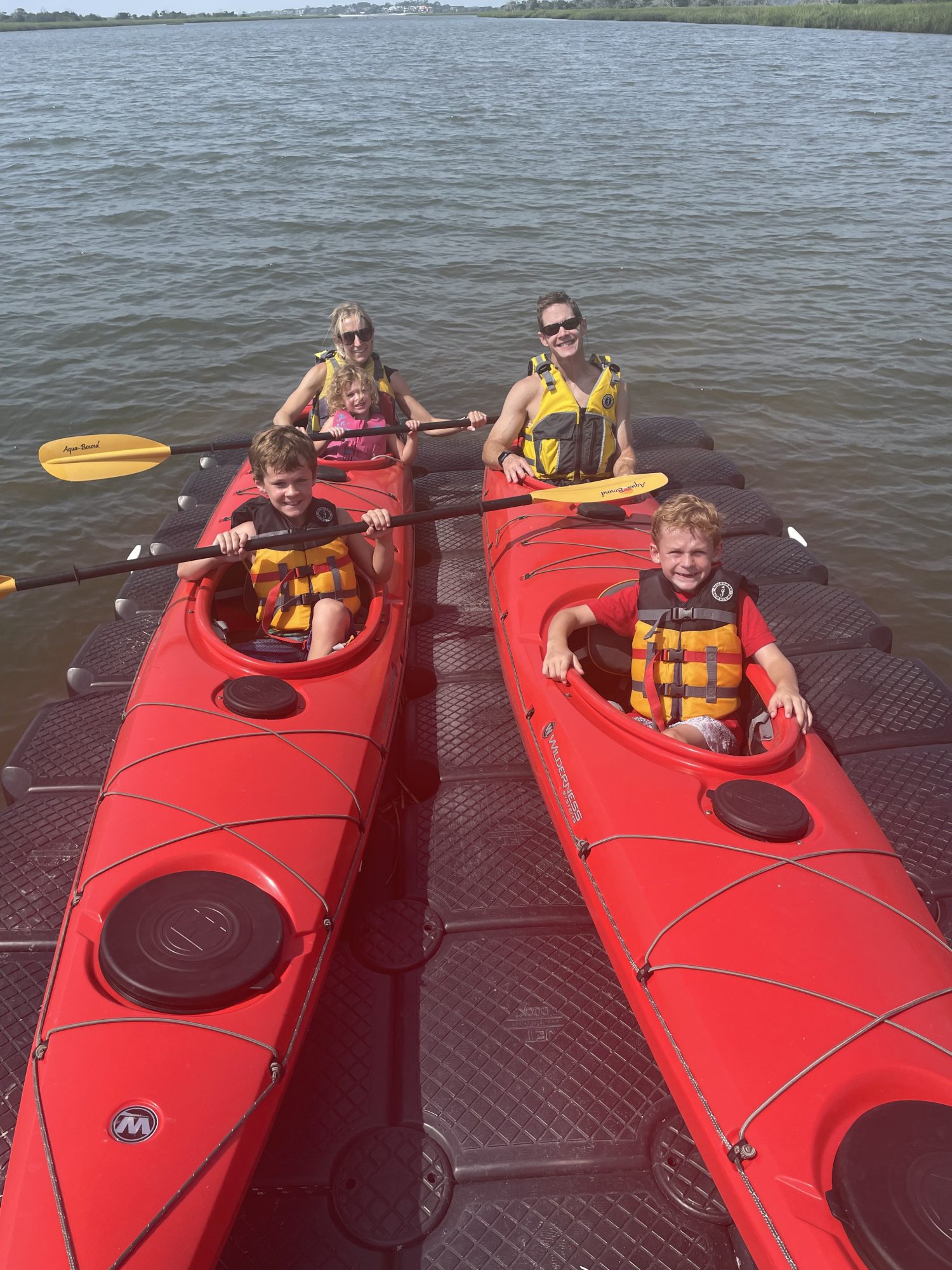 A family in a boat. 