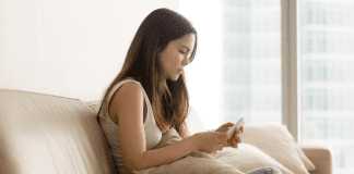 A teen on her phone.