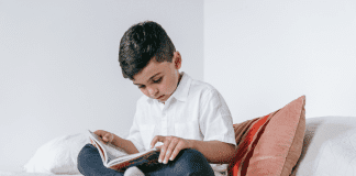 Accepting the “Yet” A boy reading a book.