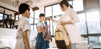 Back to Stress A mom getting her kids ready for school.