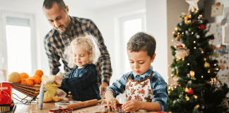The Invisible Load and the Holiday Season A father making holiday cookies with his children.