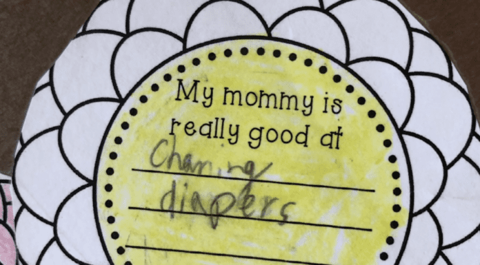 A school activity that a child writes, "My mommy is really good at changing diapers."