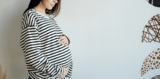 Have You Heard About MTHFR? A pregnant woman holding her belly.