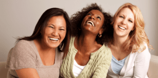 Get Inspired By International Women’s Day Three women smiling.