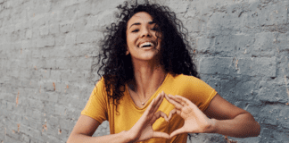 Love Your Heart, Love Your Self A woman making a heart with her hands.