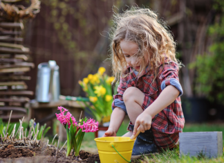 A girl planting flowers.