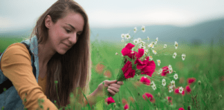 Embrace Renewal: 10 Self-Care Ideas for Spring A women picking flowers.