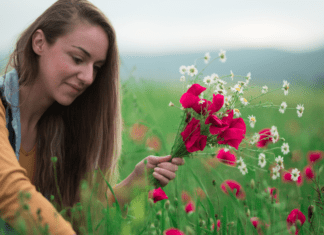 A women picking flowers.