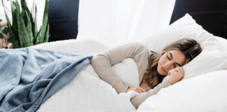 Top Tips for Better Sleep (and a Better Mood!) A woman sleeping.