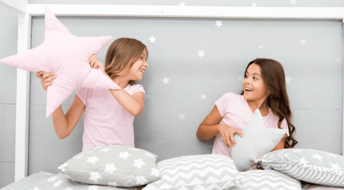 Sleepovers: It’s Not Happening Two girls having a pillow fight at a sleepover.