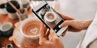 To Share or Savor Posting a photo on social media.