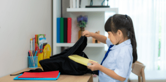 Back-to-School Organization Tips for a Smooth Transition A girl getting organized for school.