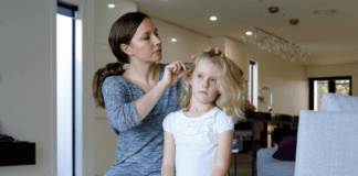 Cultivating Calm in the Chaos of Life (and Lice) A woman combing for lice.