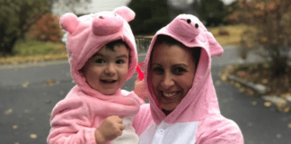 Why I Love Halloween A mom and son dressed as pigs for Halloween.