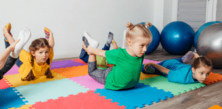 Kids exercising in a class.