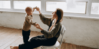 Knowing When Enough Is Enough A mother holding her child's hands.