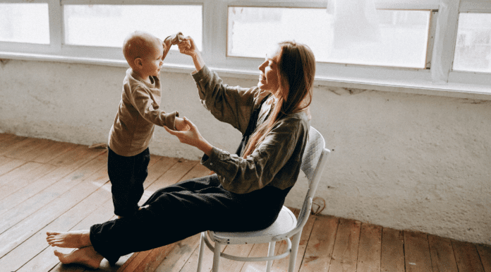 Knowing When Enough Is Enough A mother holding her child's hands.