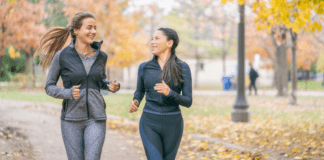 Boost Your Wellness This Fall Season Women on a walk during the fall season.