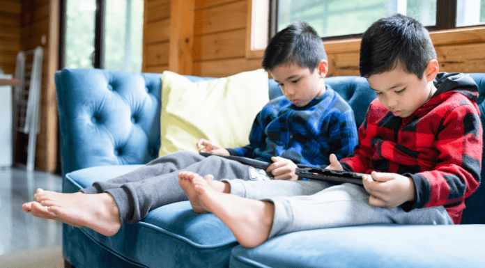 Guilt-Free Screen Time Two boys playing on iPads.