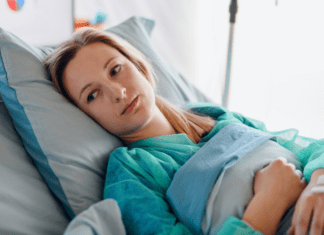 Advocating for Your Health A woman in a hospital bed.
