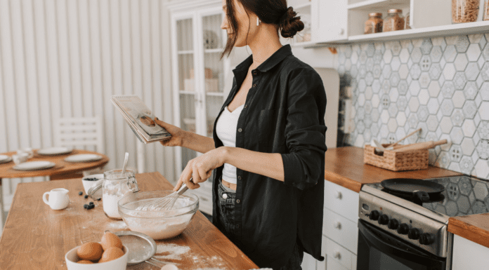 How I Learned to Cook A woman cooking in the kitchen.