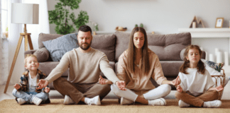 Shhh…It’s Quiet Day A family meditating together.