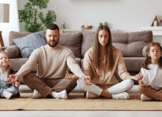 Shhh…It’s Quiet Day A family meditating together.