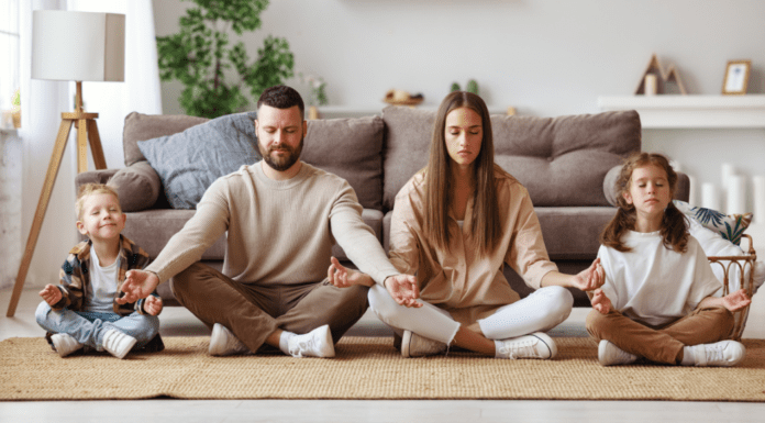 A family meditating together.