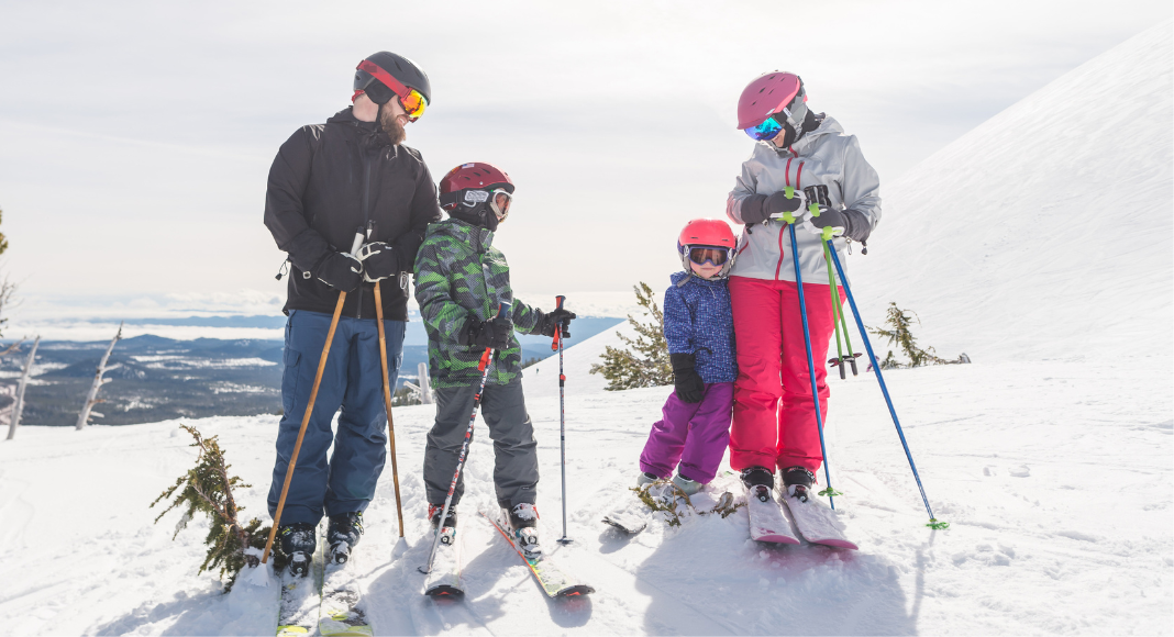 A family skiing. 