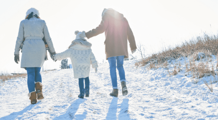 Winter Break Staycation Ideas for Families in and Around Westchester County A family on a winter hike.