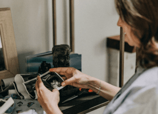 A woman looking at a sonogram.