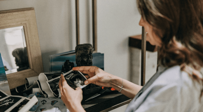 IVF: When It Often Feels Like You’re Losing Even When You’re Winning A woman looking at a sonogram.