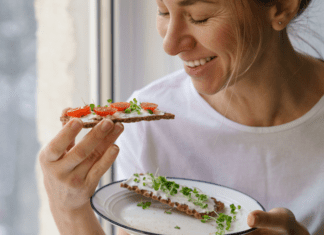 A woman eating a healthy snack.
