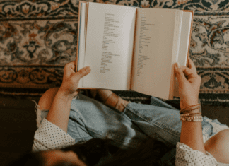 Poetry: To Read or Not to Read Someone holding a book of poetry.
