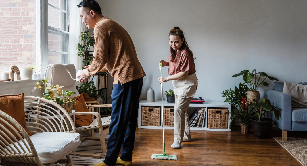 A couple preparing their home for spring. 