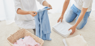 15-Minute Ideas for Spring Cleaning Your House and Your Mind A couple doing 15-minute spring organizing.