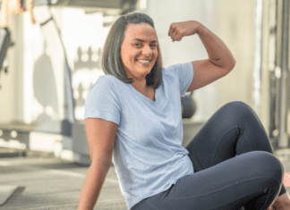 Strong Moms Equal a Strong World A strong woman making a muscle.