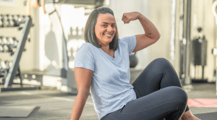 Strong Moms Equal a Strong World A strong woman making a muscle.
