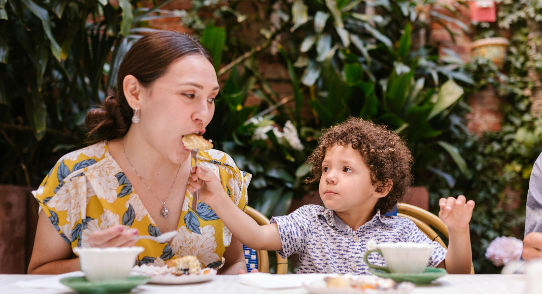 Son Feeding Mother