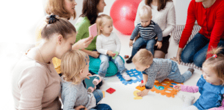 Finding Your Village A group of moms together with their babies.