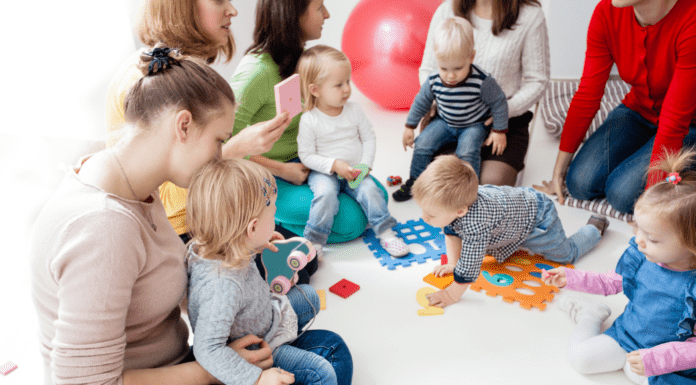 Finding Your Village A group of moms together with their babies.