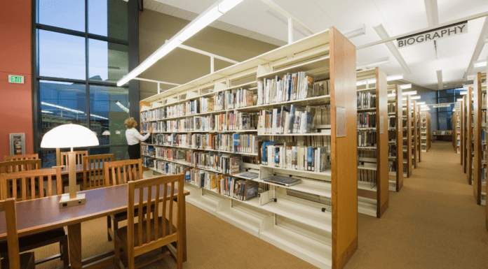 Thank You for Libraries Day A library full of booshelves.
