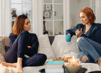 A Reason, Season, or Lifetime Two women talking on the couch.