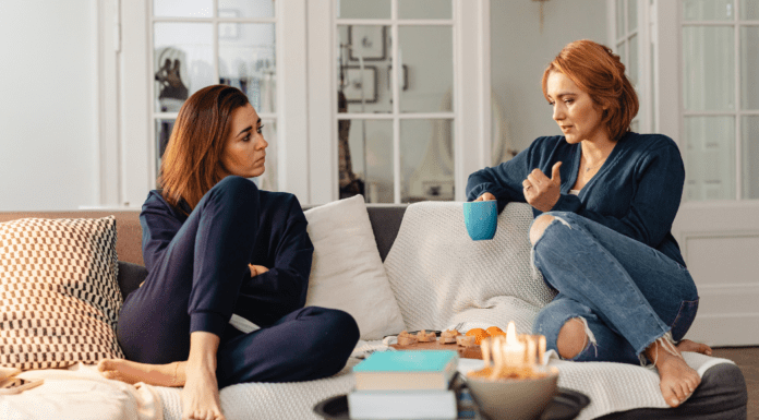 A Reason, Season, or Lifetime Two women talking on the couch.