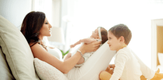 The Second Time Around: A Double-Edged Baby Spoon A mom with her baby and son.