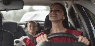 Sideline Survival: A Mom’s Playbook to Tackling the Spring Sports Season A mom driving her son to soccer practice.