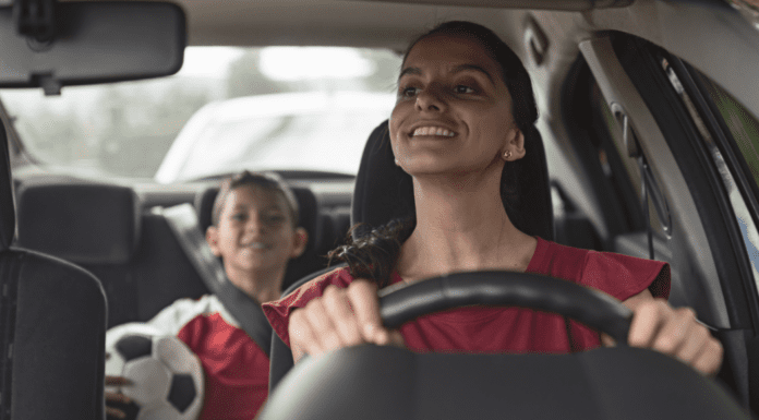 Sideline Survival: A Mom’s Playbook to Tackling the Spring Sports Season A mom driving her son to soccer practice.