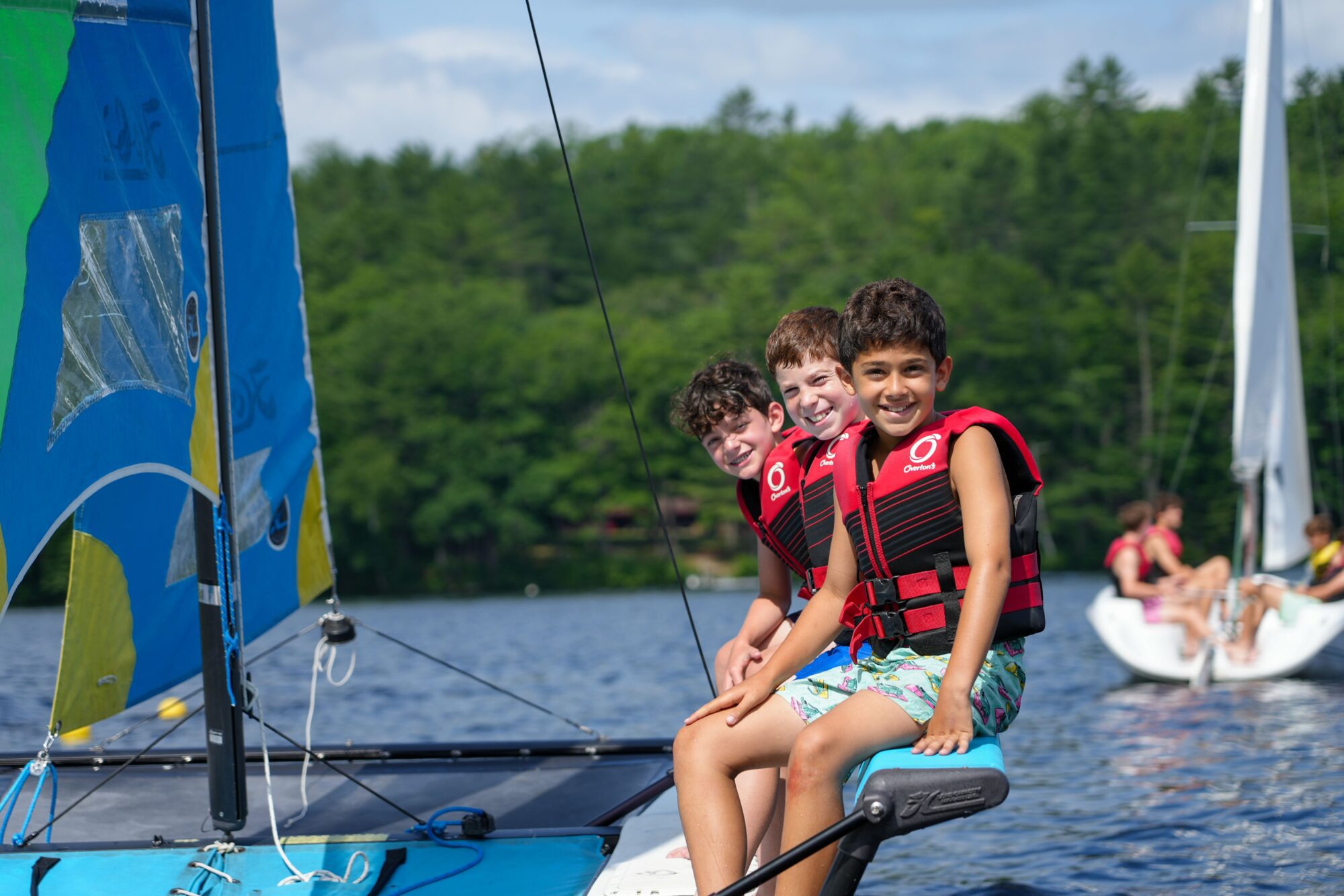 Boys on a boat at camp.