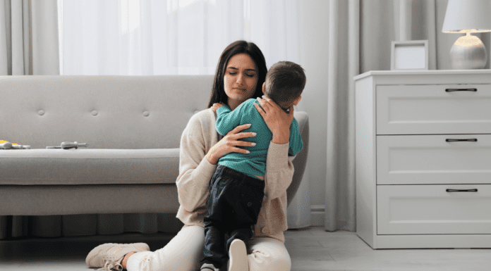 Motherhood, Mental Health, & Me A stressed mom hugging her son.